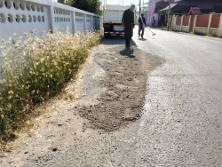 40276.jpg - กองช่าง เทศบาลตำบลสันป่าตอง ได้ดำเนินการซ่อมแซมถนนและไหล่ทาง บริเวณถนนบ้านไร่ | https://www.sanpatong.go.th